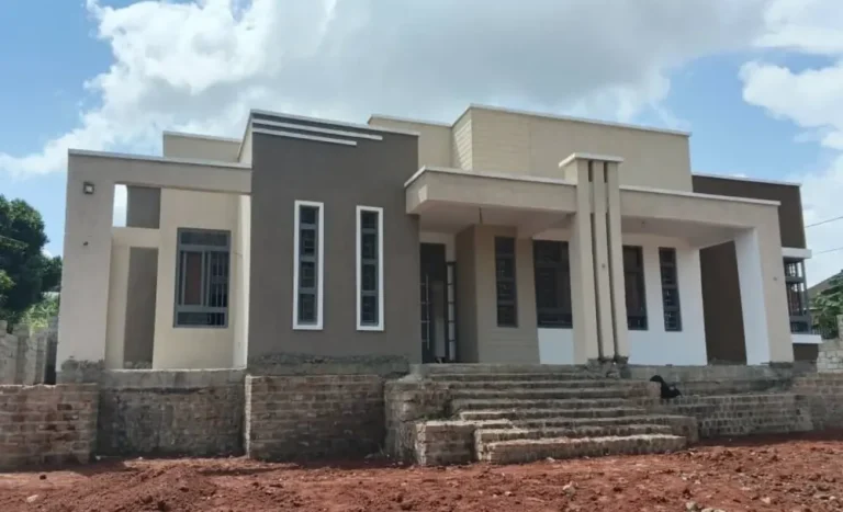Finished modern bungalow with entrance steps and flat roof